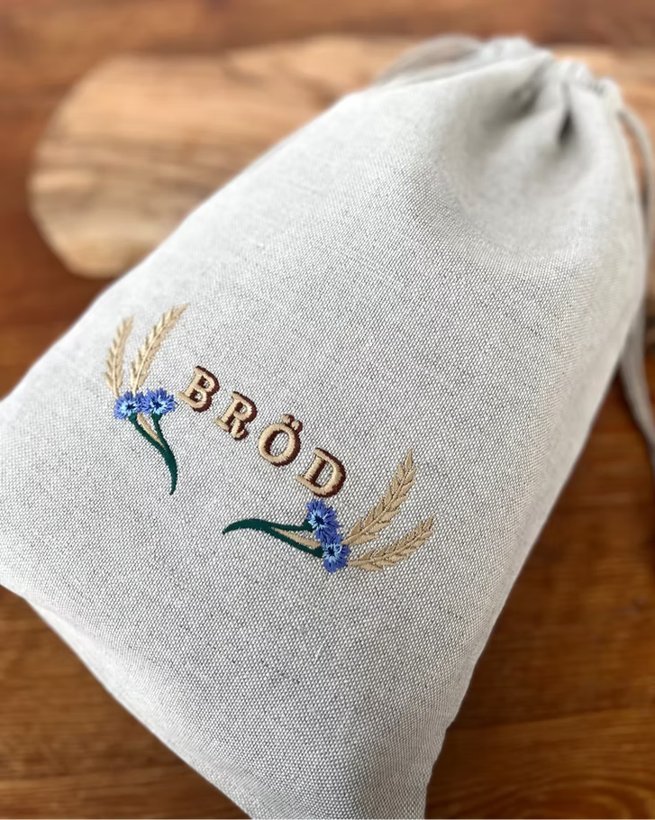 Brödpåse i linne med blåklintsmotiv med foder